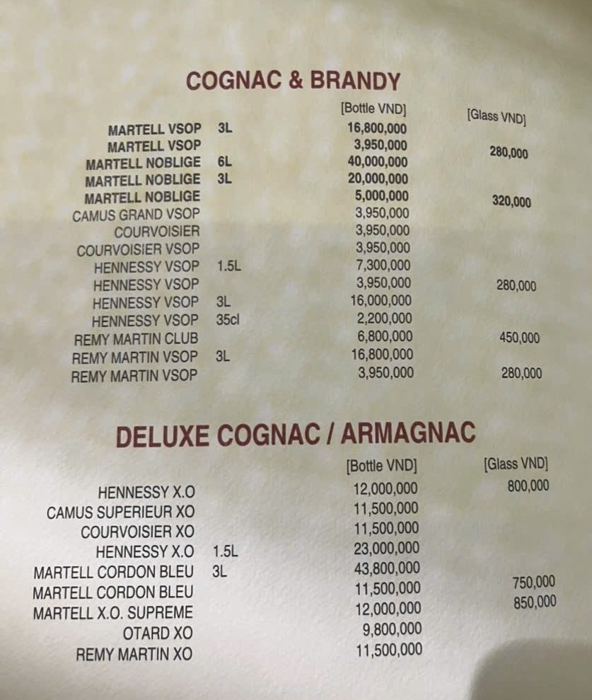 CATWALK 威士忌吧酒单实拍 · COGNAC & BRANDY 与 DELUXE COGNAC / ARMAGNAC 分区，马爹利轩尼诗人头马价目