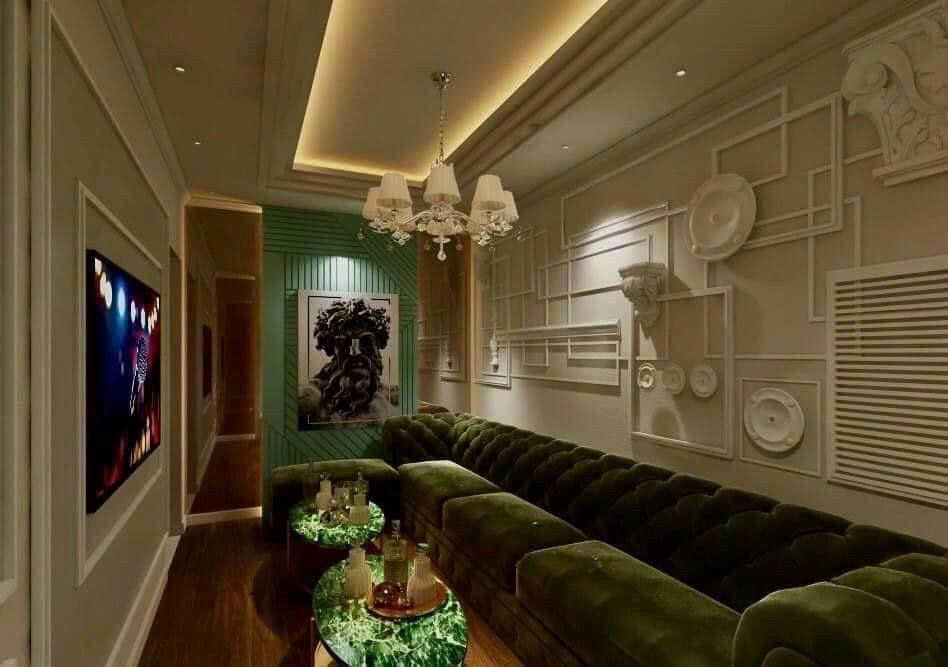 NEW 127 KTV 长条形包厢,米白色几何浮雕墙配墨绿丝绒绗缝长卡座与绿云石圆几